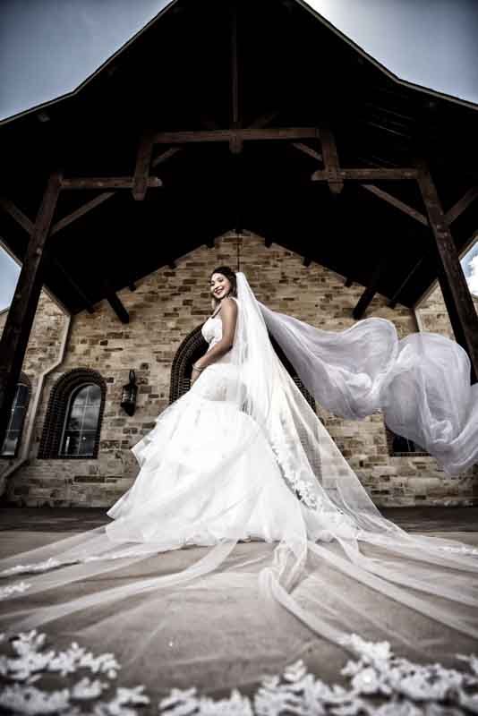 Bride and groom in an intimate moment captured at their wedding, photographed by JKPhotography Wedding Photographer